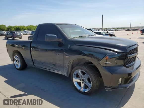 2014 Ram 1500 Express with VIN 3C6JR6AT5EG188952, listed as a Copart auction lot 67062055 with 166,740 mi miles and Salvage title. Bid and sale history available at DreamBid. Image 4.