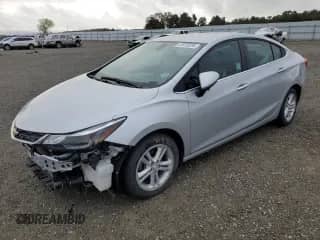 2018 Chevrolet Cruze LT with VIN 1G1BE5SM1J7242983, listed as a Copart auction lot 81910335 with 83,843 mi miles and Salvage title. Bid and sale history available at DreamBid. Image 1.