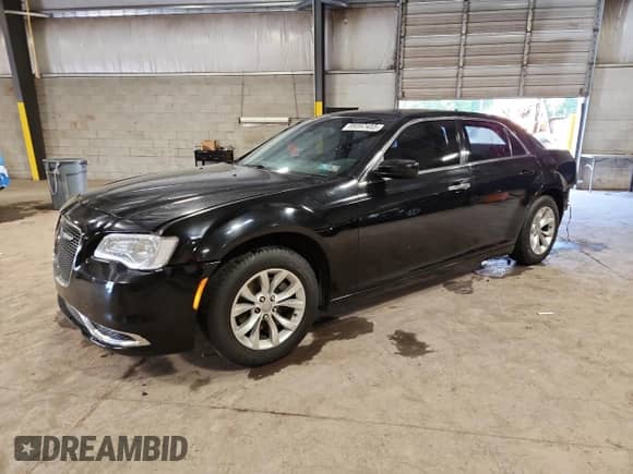 2015 Chrysler 300 Limited with VIN 2C3CCAAG4FH756008, listed as a Copart auction lot 69597485 with 158,189 mi miles and Salvage title. Bid and sale history available at DreamBid. Image 1.