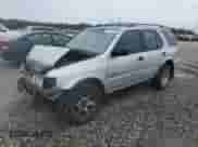 2000 Honda Passport LX with VIN 4S6CK58W0Y4409801, listed as a Copart auction lot 85376445 with 152,598 mi miles and Salvage title. Bid and sale history available at DreamBid. Image 1.