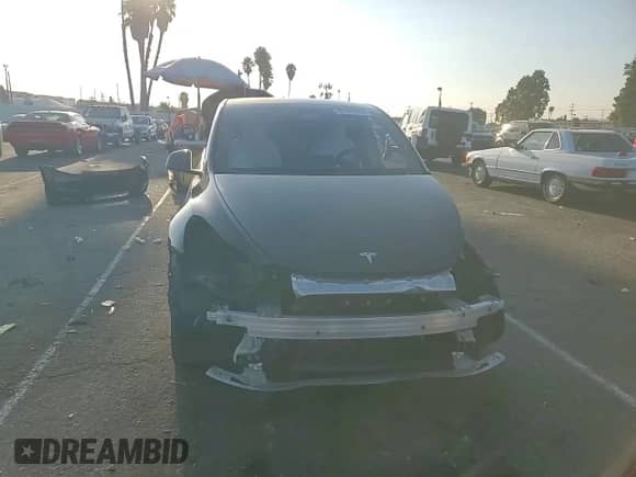 2022 Tesla Model Y Performance with VIN 7SAYGDEF9NF393852, listed as a Copart auction lot 63141094 with 26,972 mi miles and Salvage title. Bid and sale history available at DreamBid. Image 11.
