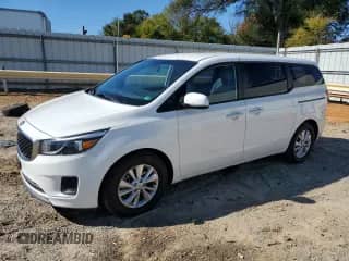 2018 Kia Sedona L with VIN KNDMA5C10J6386367, listed as a Copart auction lot 82442675 with 129,008 mi miles and Clean title. Bid and sale history available at DreamBid. Image 1.