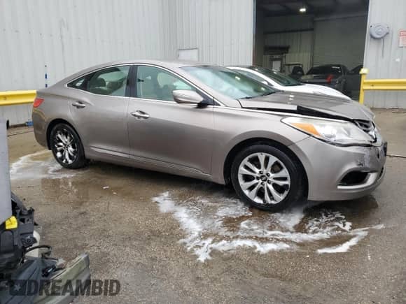 2013 Hyundai Azera с VIN KMHFG4JG0DA288574, выставлен на аукционе Copart как лот 83459544 с пробегом 179 327 миль миль и Списание • Salvage title. История ставок и продаж доступна на DreamBid. Изображение 4.