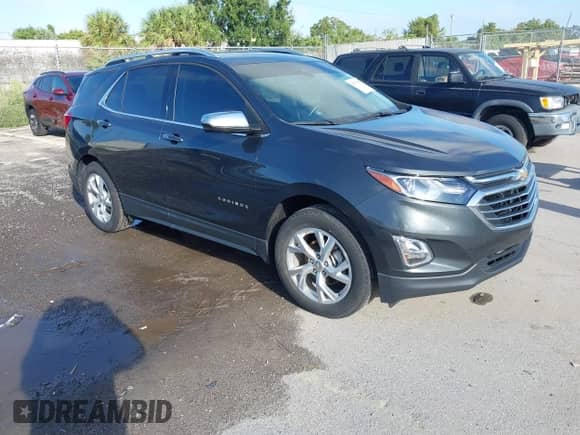 2021 Chevrolet Equinox Premier with VIN 2GNAXNEV1M6158448, listed as a IAAI auction lot 43387463 with 37,488 mi miles and . Bid and sale history available at DreamBid. Image 1.