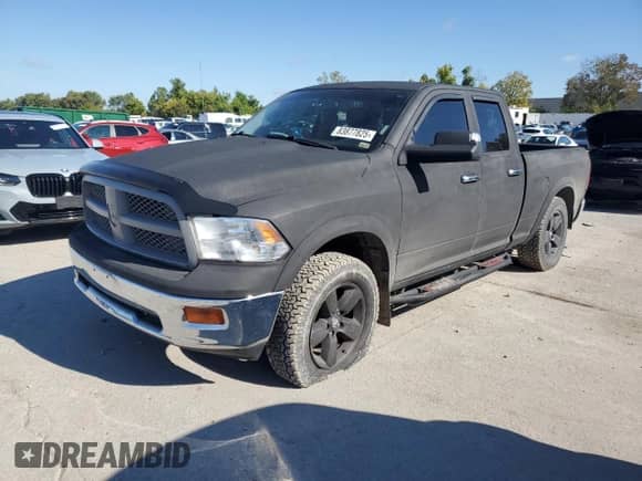 2012 Ram 1500 Laramie with VIN 1C6RD7JT5CS326504, listed as a Copart auction lot 83877825 with 223,442 mi miles and Salvage title. Bid and sale history available at DreamBid. Image 1.