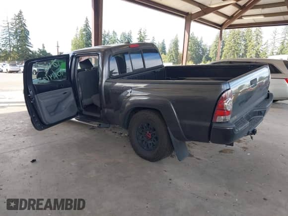 2014 Toyota Tacoma PreRunner with VIN 3TMKU4HN9EM042319, listed as a IAAI auction lot 43450085 with 89,135 mi miles and . Bid and sale history available at DreamBid. Image 3.