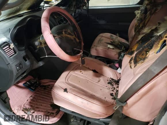 2002 Nissan Frontier SVE с VIN 1N6MD26Y12C385209, выставлен на аукционе Copart как лот 59055125 с пробегом Не указан миль и Списание • Salvage title. История ставок и продаж доступна на DreamBid. Изображение 7.