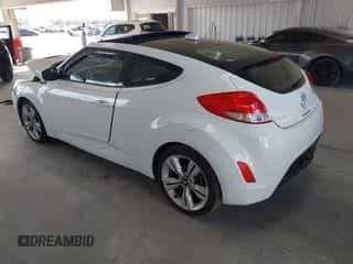 2014 Hyundai Veloster z VIN KMHTC6AD0EU193142, wystawiony jako IAAI lot #43464437 z przebiegiem 66 340 mil mil oraz . Historia ofert i sprzedaży dostępna na DreamBid. Obrazek 3.