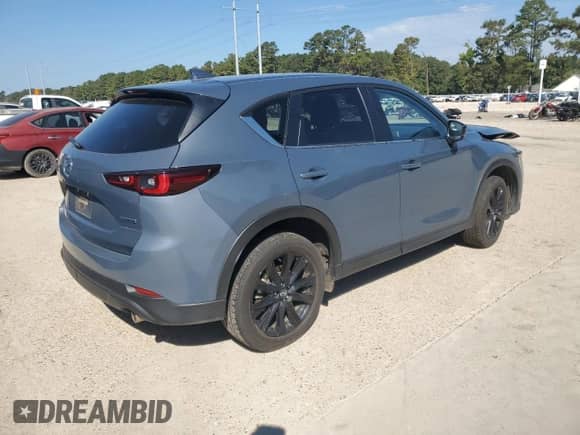 2024 Mazda CX-5 S Carbon Edition z VIN JM3KFBCLXR0513754, wystawiony jako Copart lot #84480635 z przebiegiem Nie podano mil oraz Czysty tytuł • Clean title. Historia ofert i sprzedaży dostępna na DreamBid. Obrazek 3.