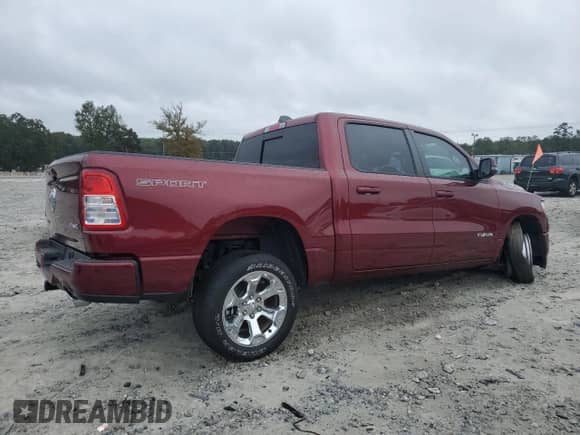 2023 Ram 1500 Lone Star with VIN 1C6SRFFT2PN704918, listed as a Copart auction lot 68173665 with 23,834 mi miles and Salvage title. Bid and sale history available at DreamBid. Image 3.