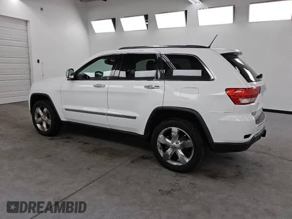 2013 Jeep Grand Cherokee Limited z VIN 1C4RJFBG3DC520134, wystawiony jako Copart lot #84387515 z przebiegiem 153 138 mil mil oraz Czysty tytuł • Clean title. Historia ofert i sprzedaży dostępna na DreamBid. Obrazek 2.