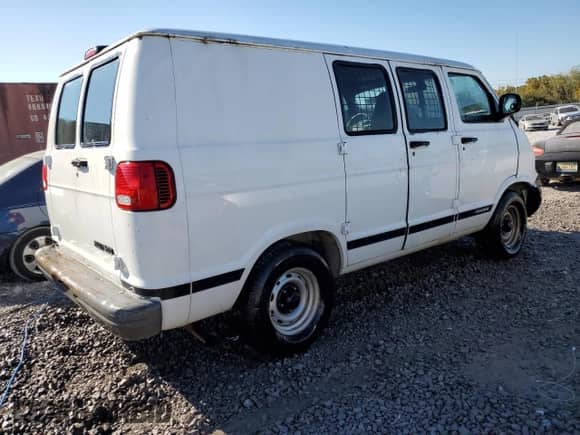 1999 Dodge Cargo with VIN 2B7HB11X9XK530023, listed as a Copart auction lot 76975974 with 219,842 mi miles and Salvage title. Bid and sale history available at DreamBid. Image 3.