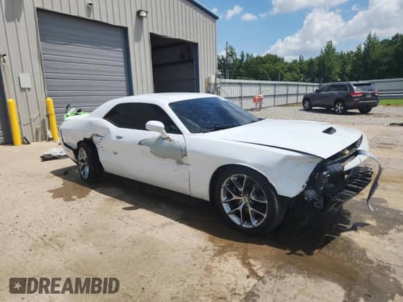 2022 Dodge Challenger GT with VIN 2C3CDZJG3NH143582, listed as a Copart auction lot 65906025 with 83,346 mi miles and Salvage title. Bid and sale history available at DreamBid. Image 4.