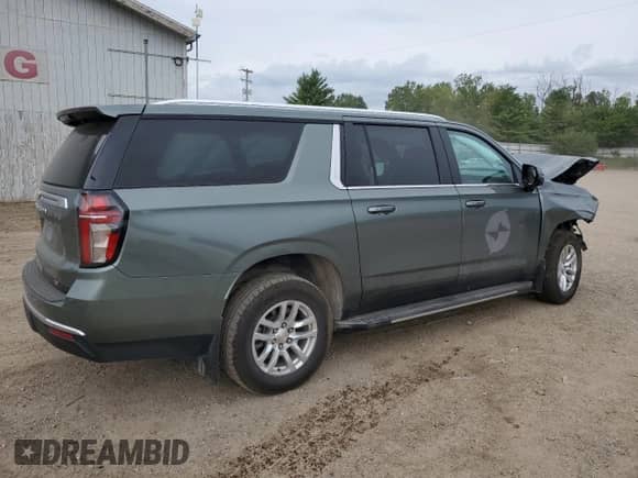 2023 Chevrolet Suburban LT with VIN 1GNSKCKD2PR164058, listed as a Copart auction lot 70387065 with 58,551 mi miles and Salvage title. Bid and sale history available at DreamBid. Image 3.