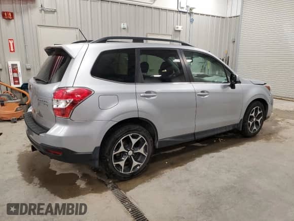 2014 Subaru Forester XT Premium with VIN JF2SJGDC7EH551443, listed as a Copart auction lot 71054875 with 105,734 mi miles and Clean title. Bid and sale history available at DreamBid. Image 3.