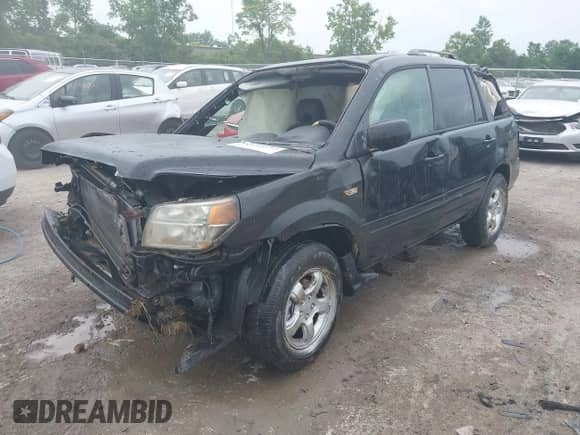 2006 Honda Pilot EX-L z VIN 2HKYF18626H541059, wystawiony jako IAAI lot #42689539 z przebiegiem 227 054 mil mil oraz . Historia ofert i sprzedaży dostępna na DreamBid. Obrazek 18.