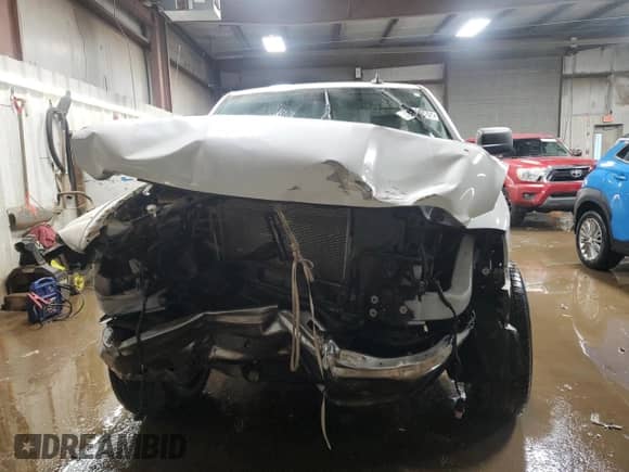 2022 Ram 1500 Tradesman with VIN 3C6JR6DT7NG205584, listed as a Copart auction lot 87599465 with 22,624 mi miles and Salvage title. Bid and sale history available at DreamBid. Image 5.