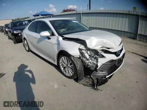 2019 Toyota Camry Hybrid LE с VIN 4T1B21HK2KU512025, выставлен на аукционе Copart как лот 80734415 с пробегом 106 463 миль миль и Списание • Salvage title. История ставок и продаж доступна на DreamBid. Изображение 13.