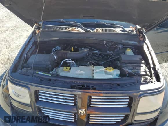 2011 Dodge Nitro SXT с VIN 1D4PT5GK5BW550369, выставлен на аукционе Copart как лот 49804245 с пробегом 141 212 миль миль и Списание • Salvage title. История ставок и продаж доступна на DreamBid. Изображение 12.