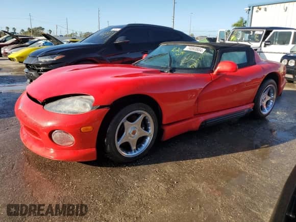 1995 Dodge Viper with VIN 1B3BR65E7SV200130, listed as a Copart auction lot 74893804 with 17,482 mi miles and Non repairable. Bid and sale history available at DreamBid. Image 1.