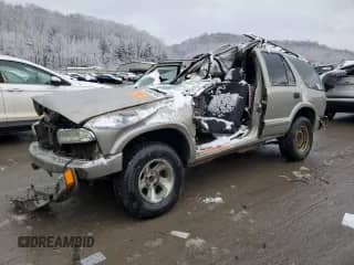 2003 Chevrolet Blazer LS с VIN 1GNCS13X63K129026, выставлен на аукционе Copart как лот 84567954 с пробегом Не указан миль и Списание • Salvage title. История ставок и продаж доступна на DreamBid. Изображение 1.