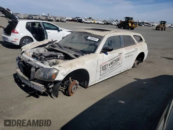 2005 Dodge Magnum SE with VIN 2D4FV48V75H151670, listed as a Copart auction lot 73364834 with Not provided miles and Salvage title. Bid and sale history available at DreamBid. Image 1.