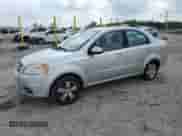 2011 Chevrolet Aveo 1LT with VIN KL1TD5DE4BB229302, listed as a Copart auction lot 66280195 with 144,467 mi miles and Salvage title. Bid and sale history available at DreamBid. Image 1.
