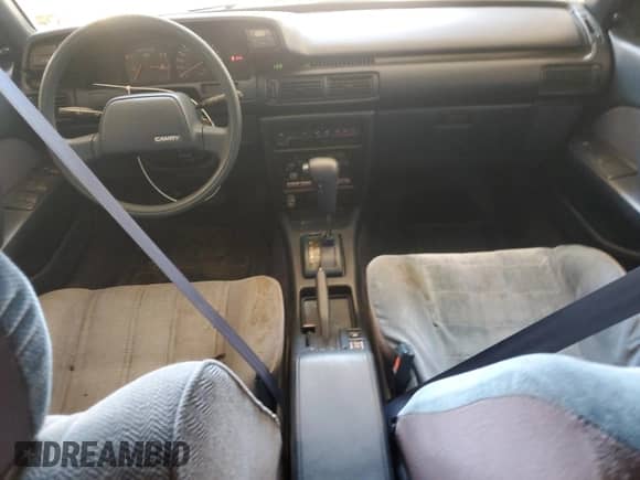 1991 Toyota Camry z VIN JT2SV21W6M0382364, wystawiony jako Copart lot #65835945 z przebiegiem 179 206 mil mil oraz Czysty tytuł • Clean title. Historia ofert i sprzedaży dostępna na DreamBid. Obrazek 8.