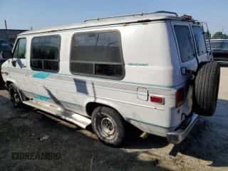 1994 Chevrolet Chevy Van с VIN 1GBEG25K1RF118547, выставлен на аукционе Copart как лот 74319254 с пробегом 179 866 миль миль и Чистый • Clean title. История ставок и продаж доступна на DreamBid. Изображение 2.