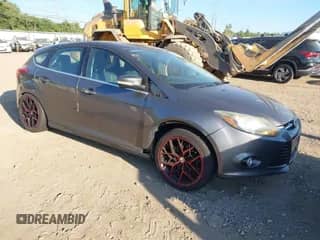 2014 Ford Focus Titanium with VIN 1FADP3N25EL269745, listed as a IAAI auction lot 43100661 with 177,043 mi miles and . Bid and sale history available at DreamBid. Image 1.