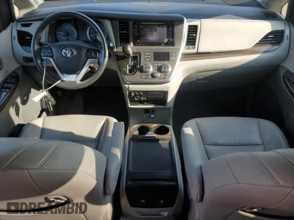 2017 Toyota Sienna XLE with VIN 5TDYZ3DC7HS899401, listed as a Copart auction lot 80454085 with 75,197 mi miles and Salvage title. Bid and sale history available at DreamBid. Image 8.