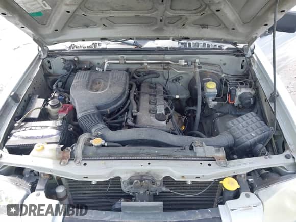 2003 Nissan Frontier XE z VIN 1N6DD26T43C414322, wystawiony jako IAAI lot #41849913 z przebiegiem 199 714 mil mil oraz . Historia ofert i sprzedaży dostępna na DreamBid. Obrazek 10.