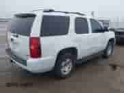 2007 Chevrolet Tahoe LTZ z VIN 1GNFC13017R275263, wystawiony jako IAAI lot #42151951 z przebiegiem 210 574 mil mil oraz . Historia ofert i sprzedaży dostępna na DreamBid. Obrazek 4.