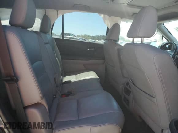 2019 Honda Pilot Touring 8-Passenger with VIN 5FNYF6H99KB033154, listed as a Copart auction lot 70672085 with 104,300 mi miles and Salvage title. Bid and sale history available at DreamBid. Image 11.