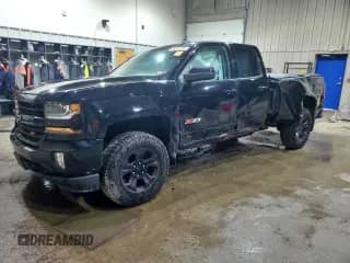 2018 Chevrolet Silverado 1500 LT with VIN 1GCVKRECXJZ144434, listed as a Copart auction lot 65052295 with 199,223 mi miles and Salvage title. Bid and sale history available at DreamBid. Image 1.