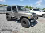 2006 Jeep Wrangler SE z VIN 1J4FA29S06P701557, wystawiony jako Copart lot #68312385 z przebiegiem 117 383 mil mil oraz Szkoda całkowita • Salvage title. Historia ofert i sprzedaży dostępna na DreamBid. Obrazek 4.