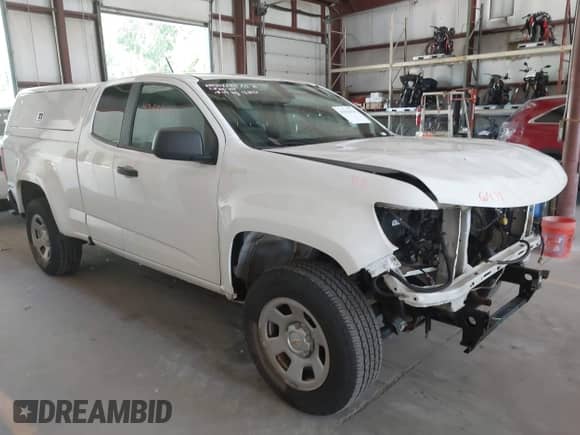 2021 Chevrolet Colorado 2WD Work Truck with VIN 1GCHSBEAXM1119006, listed as a IAAI auction lot 42556434 with 75,704 mi miles and . Bid and sale history available at DreamBid. Image 1.