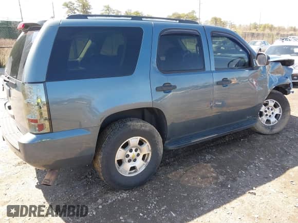 2009 Chevrolet Tahoe LS z VIN 1GNFC13099R196717, wystawiony jako IAAI lot #41970942 z przebiegiem 236 453 mil mil oraz . Historia ofert i sprzedaży dostępna na DreamBid. Obrazek 4.