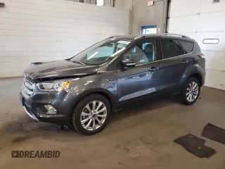 2017 Ford Escape Titanium с VIN 1FMCU9J92HUD53813, выставлен на аукционе Copart как лот 81221285 с пробегом 46 881 миль миль и Списание • Salvage title. История ставок и продаж доступна на DreamBid. Изображение 1.