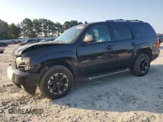 2009 Chevrolet Tahoe 2LT z VIN 1GNFK230X9R295149, wystawiony jako Copart lot #69832915 z przebiegiem 141 619 mil mil oraz Szkoda całkowita • Salvage title. Historia ofert i sprzedaży dostępna na DreamBid. Obrazek 1.