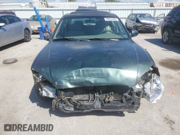 2001 Hyundai Sonata GLS z VIN KMHWF35V11A485934, wystawiony jako Copart lot #69853585 z przebiegiem 120 924 mil mil oraz Szkoda całkowita • Salvage title. Historia ofert i sprzedaży dostępna na DreamBid. Obrazek 5.