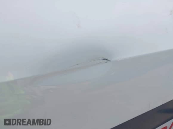 2015 Chevrolet Trax LS z VIN 3GNCJKSB0FL255335, wystawiony jako IAAI lot #42813743 z przebiegiem 168 411 mil mil oraz . Historia ofert i sprzedaży dostępna na DreamBid. Obrazek 6.