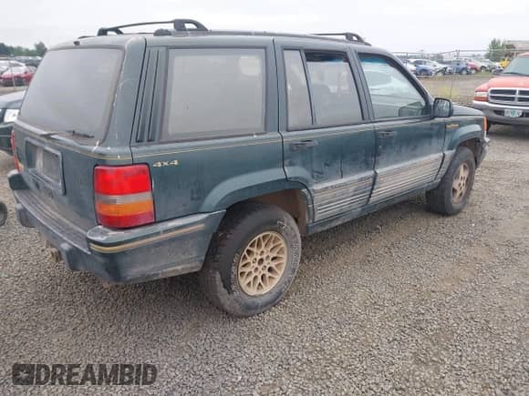 1993 Jeep Grand Cherokee Limited z VIN 1J4GZ78S1PC525798, wystawiony jako IAAI lot #42572328 z przebiegiem 197 551 mil mil oraz . Historia ofert i sprzedaży dostępna na DreamBid. Obrazek 4.