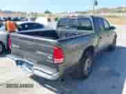 2004 Dodge Dakota SLT with VIN 1D7HL48K24S618072, listed as a IAAI auction lot 42001943 with 202,449 mi miles and . Bid and sale history available at DreamBid. Image 4.