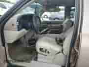 2004 Chevrolet Tahoe LS with VIN 1GNEC13ZX4R152843, listed as a Copart auction lot 51775035 with 294,488 mi miles and Salvage title. Bid and sale history available at DreamBid. Image 7.