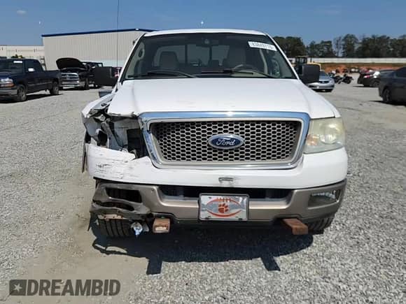 2004 Ford F-150 XLT z VIN 1FTPW14554KD18960, wystawiony jako Copart lot #83849715 z przebiegiem 192 264 mil mil oraz Szkoda całkowita • Salvage title. Historia ofert i sprzedaży dostępna na DreamBid. Obrazek 13.