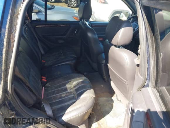 2000 Jeep Grand Cherokee Limited with VIN 1J4GW58N4YC325524, listed as a IAAI auction lot 43245506 with 128,565 mi miles and . Bid and sale history available at DreamBid. Image 8.