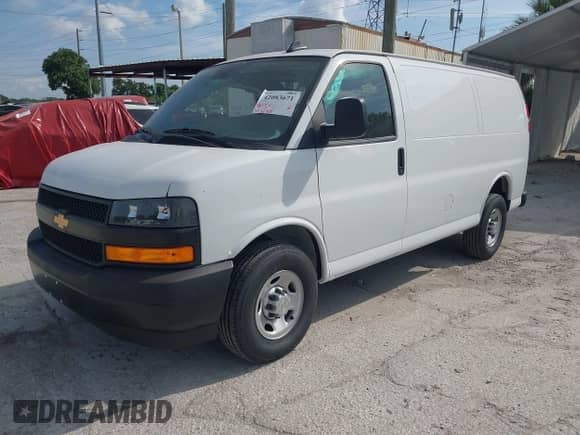 2024 Chevrolet Express Cargo with VIN 1GCWGAF72R1195073, listed as a IAAI auction lot 42083671 with 4,690 mi miles and . Bid and sale history available at DreamBid. Image 2.
