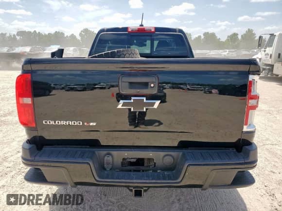 2018 Chevrolet Colorado 2WD Z71 с VIN 1GCHSDEN6J1176670, выставлен на аукционе Copart как лот 64786195 с пробегом 50 131 миль миль и Списание • Salvage title. История ставок и продаж доступна на DreamBid. Изображение 6.