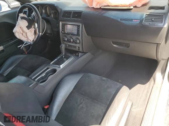 2012 Dodge Challenger SRT-8 392 с VIN 2C3CDYCJ6CH167309, выставлен на аукционе Copart как лот 64902735 с пробегом 124 180 миль миль и Списание • Salvage title. История ставок и продаж доступна на DreamBid. Изображение 8.